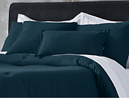 Cojín de terciopelo Raka