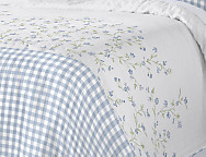 Bouti reversible Cyntia con funda/s de cojín color Azul o Caldera