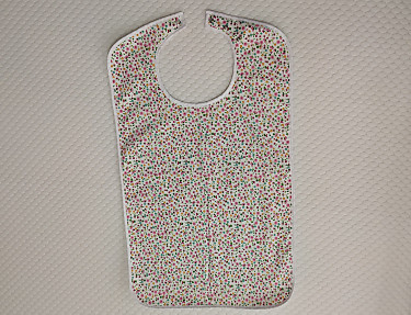 Nuestros Productos - Babero impermeable adulto Flores