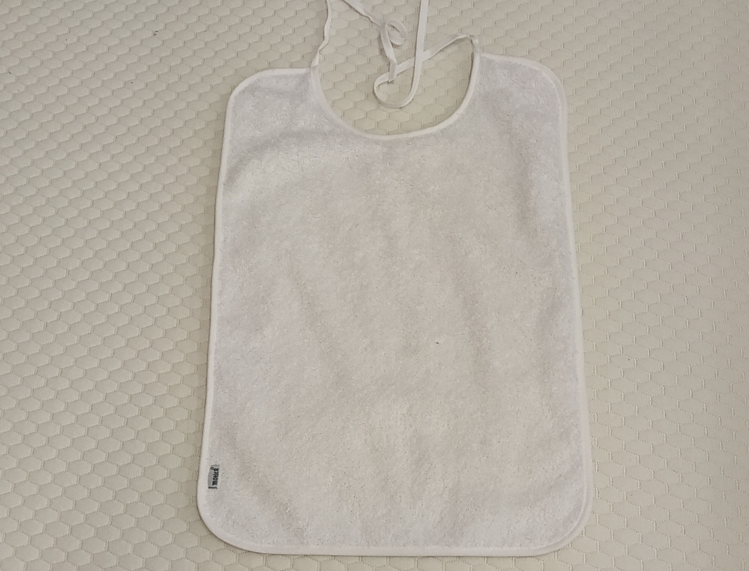 Nuestros Productos Babero impermeable adulto Rizo